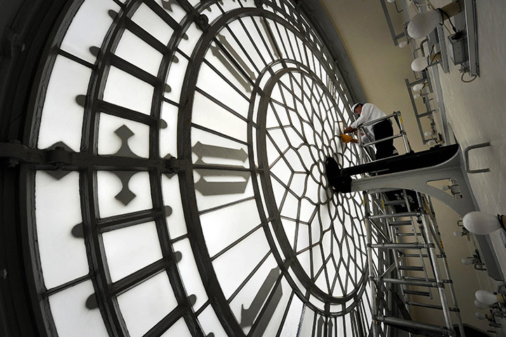 24 Hours in Pictures: Workers make internal glazing repairs to one of the faces of Big Ben