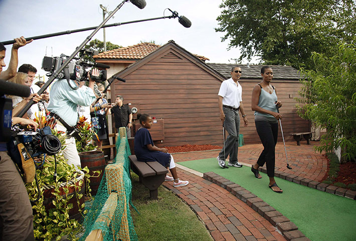 obama in florida: U.S. President Obama and his family play golf in Panama City Beach