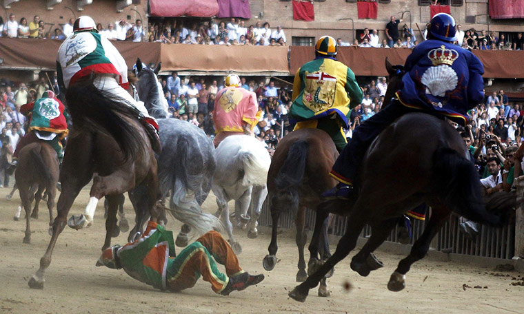 Palio race: Jockey of Selva parish Alberto Ricceri falls during the Palio race 