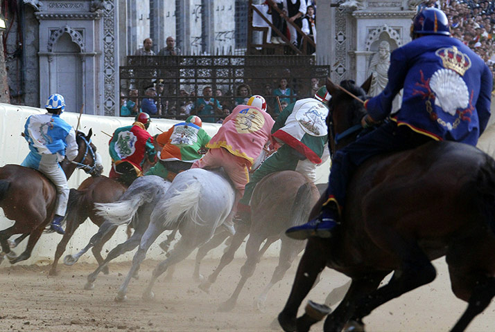 Palio race: Jockeys compete in the Palio race in Siena