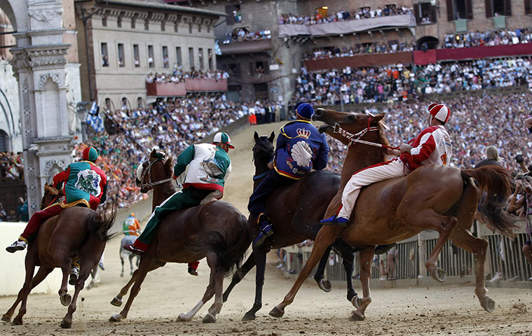 Palio race: Jockeys rides their horse during a training session for the Palio