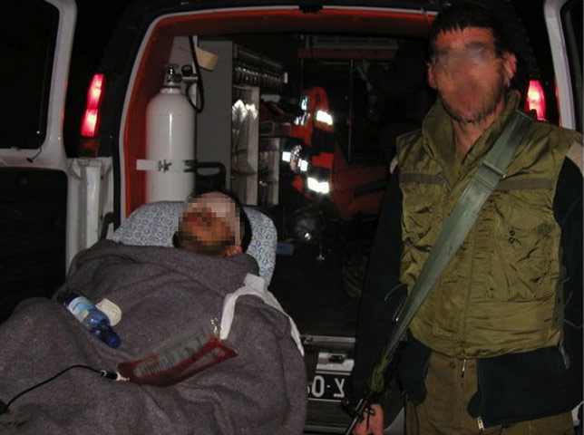 Israeli replace: members of the Israeli Defence Force posing with captured Palestinians