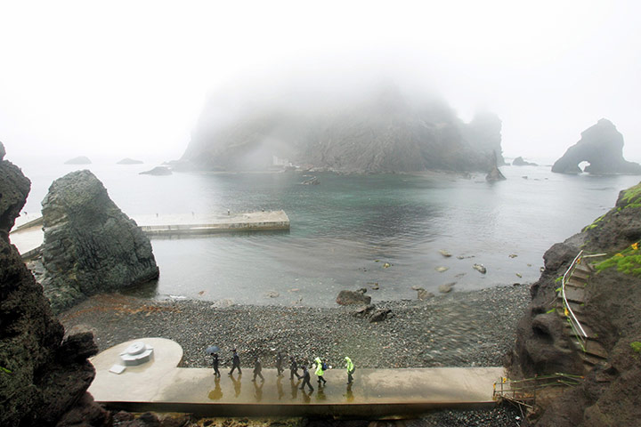 Korean Islands: South Korean police patrol on a group of desolate volcanic islets 