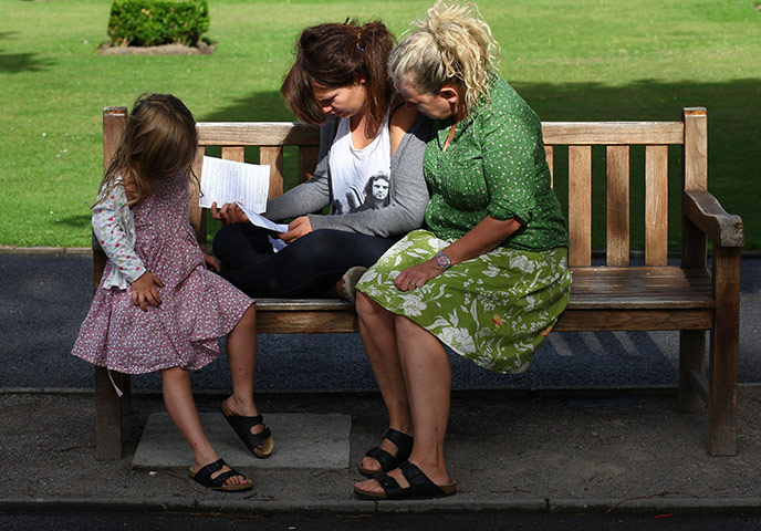 A Level Results: A student is consoled after receiving her A-Level exam results