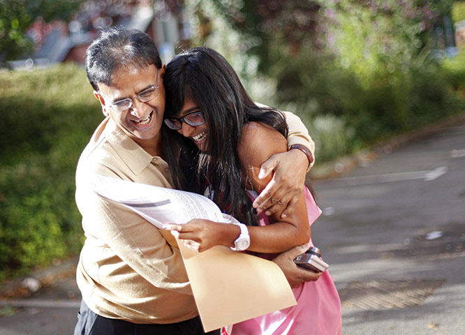 A Level Results: Anisha Patel celebrates with her father, A-level exam results