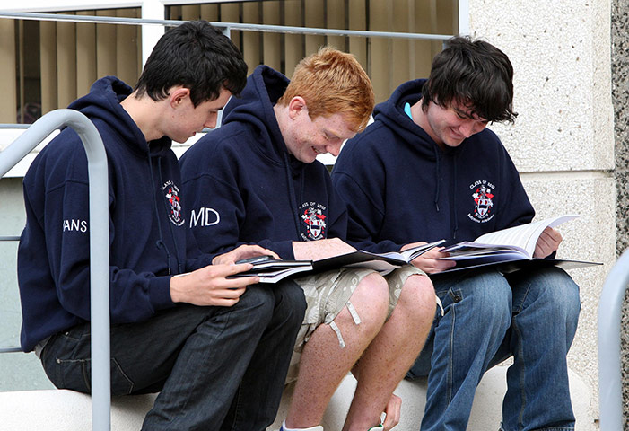 A Level Results: Pupils celebrate after receiving their A-level results in Co Antrim