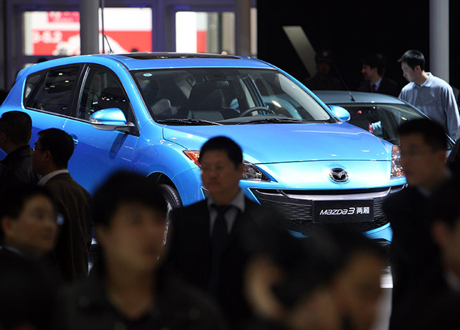 Week in Business: Mazda Motor Corp.'s Mazda 3 displayed at the Beijing Auto Show 