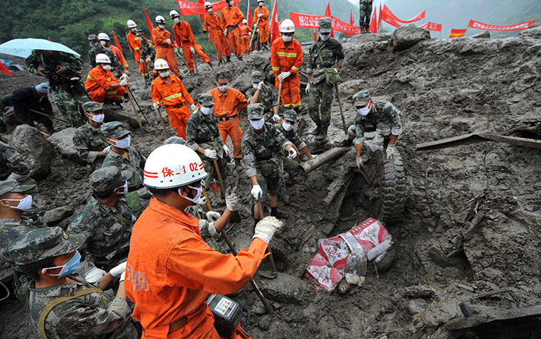 24 Hours in Pictures: Heavy rain triggers flooding and landslides in China