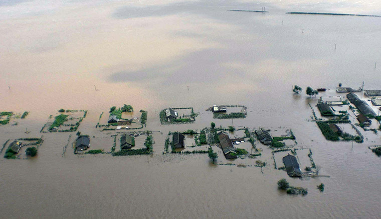 24 Hours in Pictures: Houses submerged in floodwaters in North Pyongan province, North Korea