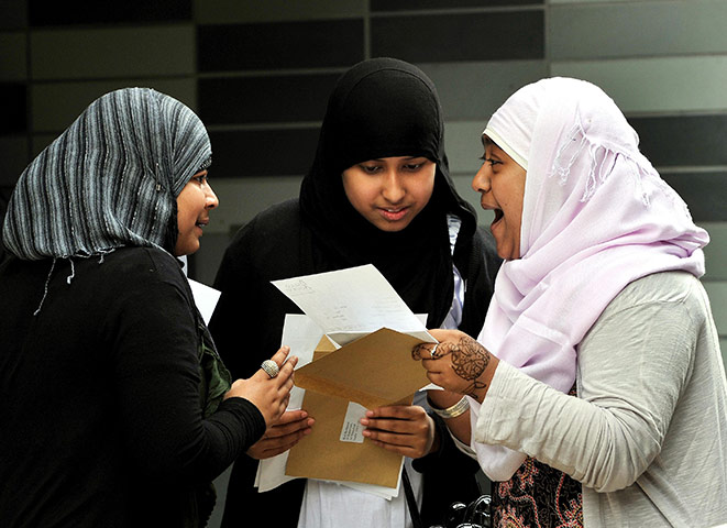 GCSE Results Released: Pupils celebrate as they receive their GCSE results, at the Pimlico Academy