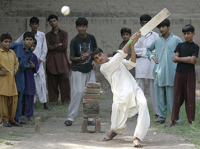 Pakistan Flood Update: A flood survivor plays cricket outside a school in Pakistan