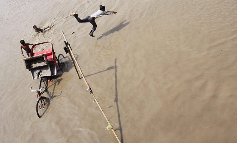 24 hours in pictures: Flood waters of River Yamuna in New Delhi, India