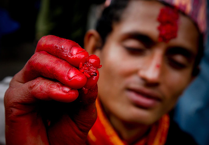 24 hours in pictures: Janai Purnima festival at Kumbheshwor temple