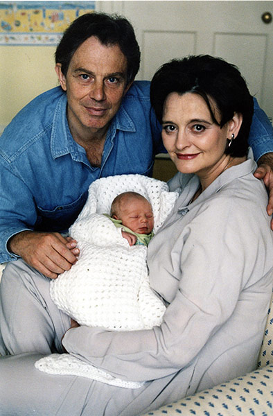 Cameron Baby Downing St: Tony Blair with his wife Cherie and their new son Leo