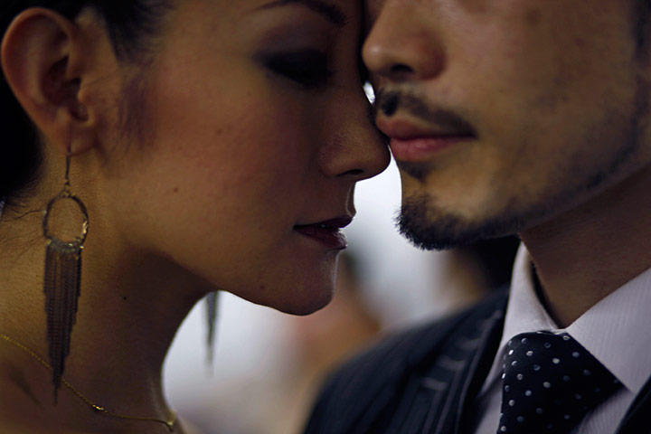 Tango Championships: A couple warm up at the World Tango Championship in Buenos Aires