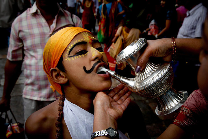 24 hours in pictures: Gai Jatra Festival in Kathmandu