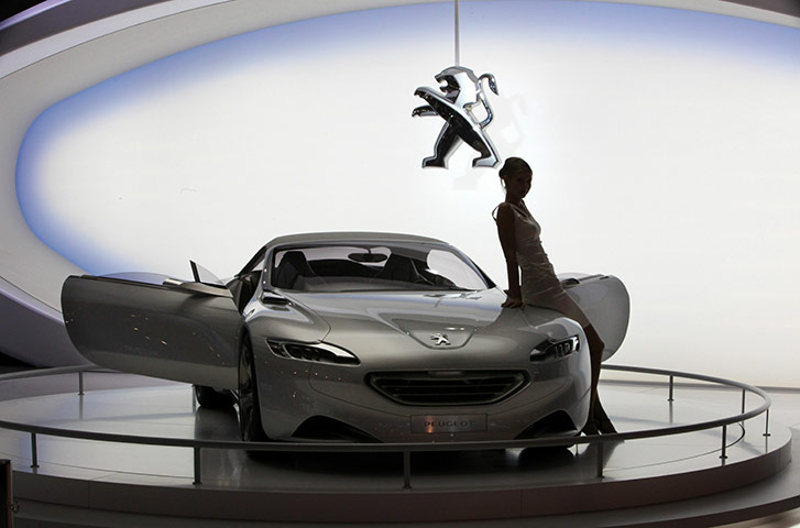 Moscow Auto Show: A model presents a Peugeot car concept during the Moscow Automobile Show