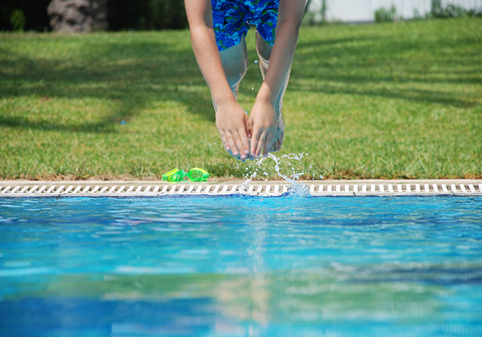 In pictures: Refresh: boy diving into swimming pool