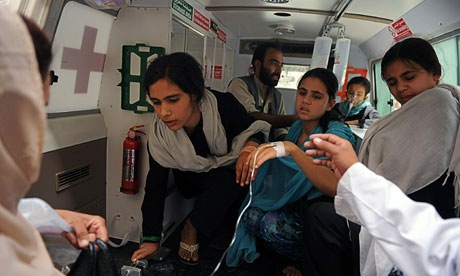 Afghan schoolgirls after suspected poison attack