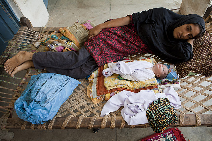 Pakistan Pregnant Women: Shenaz bibi, 20,  with her two-day-old baby boy, at a Primary School 