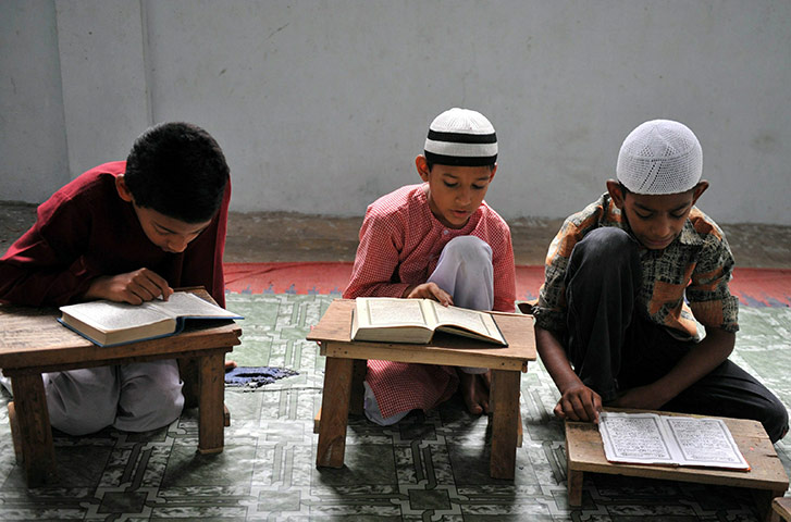 Ramadan Update: Students read religious texts at an education center in India