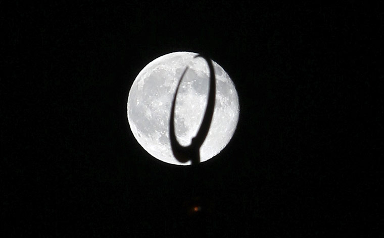 Ramadan Update: The waning gibbous moon is seen above the minaret in Damascus