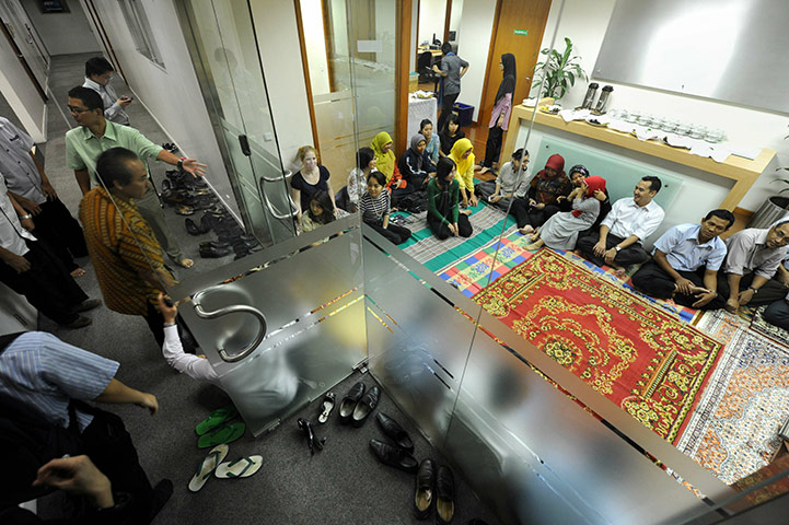 Ramadan Update: Indonesian employees of Mercedes-Benz arrive for prayers before iftar