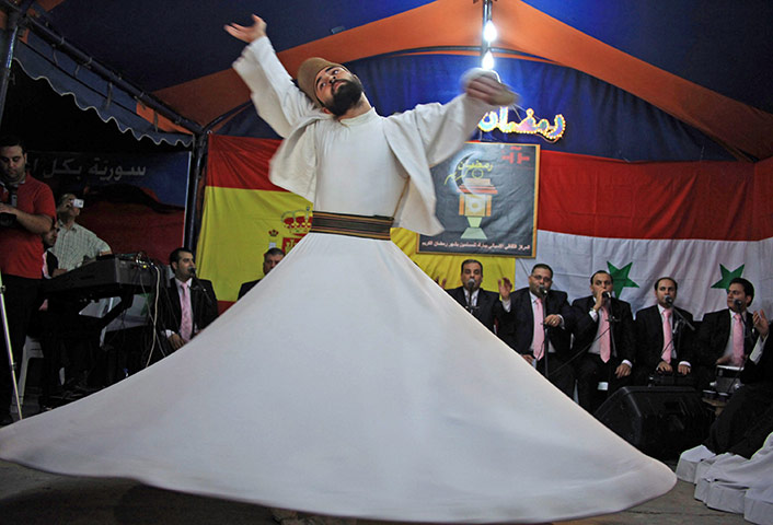 Ramadan Update: Whirling Dervish perform during a concert in Damascus