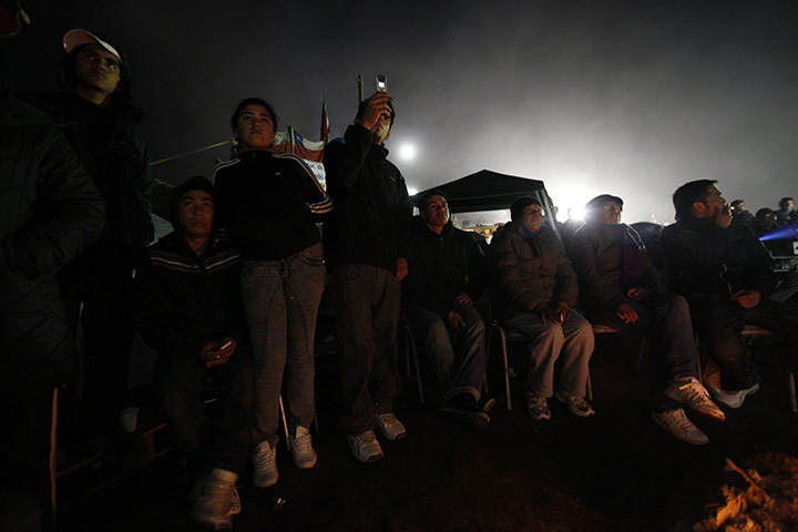 Chile Miners Update: Relatives and journalists watch new images of the miners in Copiapo, Chile