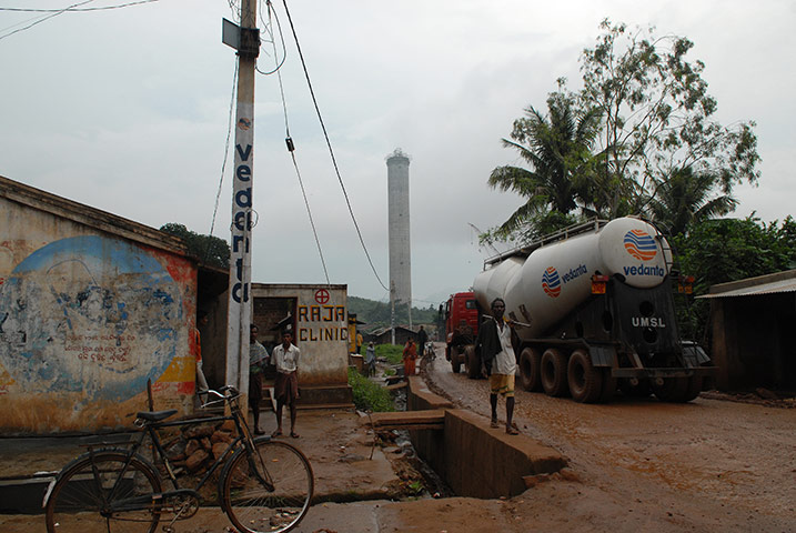 Business week in pictures: A vehicle belonging to the Vedanta drivers through a village in Orissa