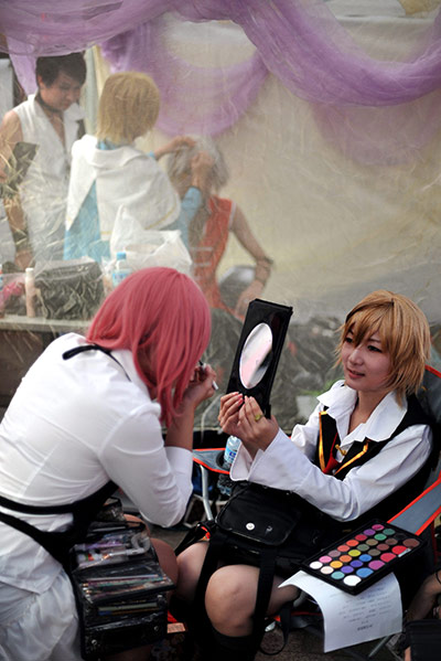 24 hours: Qingdao city, China: Chinese teenagers dressed in cartoon-like outfits 