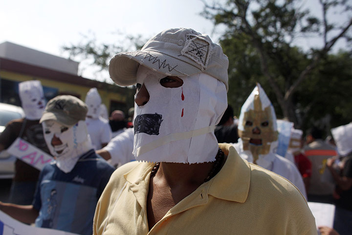 24 hours: Saltillo, Mexico: Migrants from Guatemala and El Salvador cover their faces