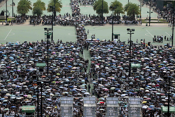 24 hours: Hong Kong, China: Protesters take to the streets to express their grief