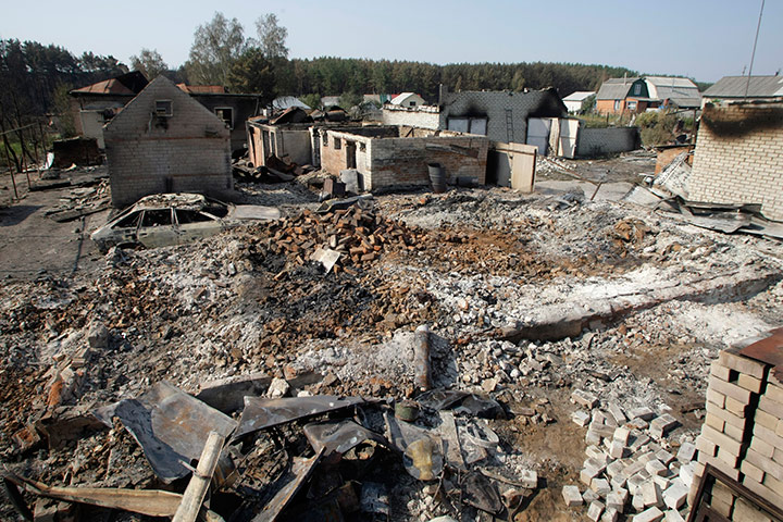 russian fire update: Ruin of houses destroyed by a forest fire at Shuberskoe, Russia