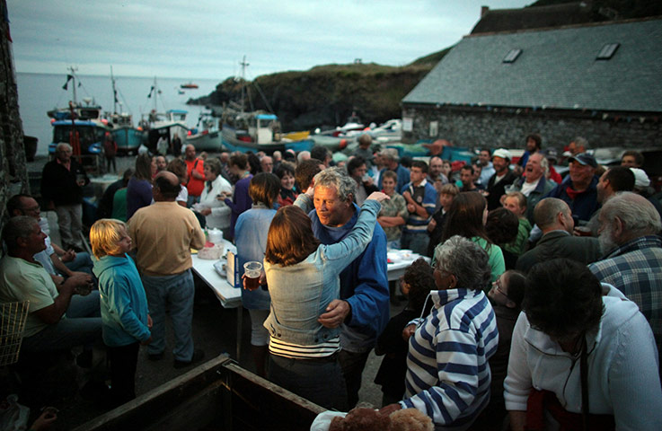 Helston fishing: A fisherman celebrates winning in the fortnightly fishing competition