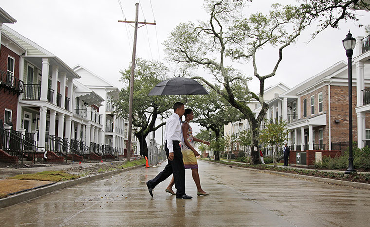 Obama in New Orleans: President Barack Obama walks in the Columbia Parc Development