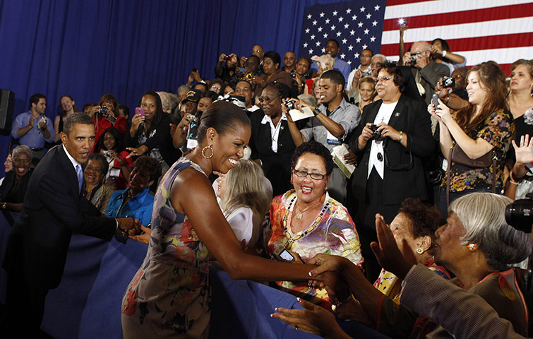 Obama in New Orleans: Barack Obama and Michelle Obama greet spectators at Xavier University