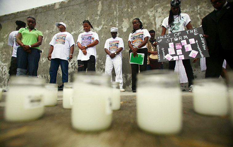 Obama in New Orleans: Mourners pray during healing ceremony at the Lower Ninth Ward levee breach