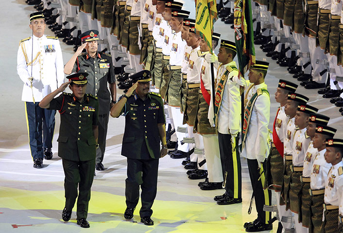 Malaysian Independence: Malaysian King Sultan Mizan Zainal Abidin salutes during celebrations