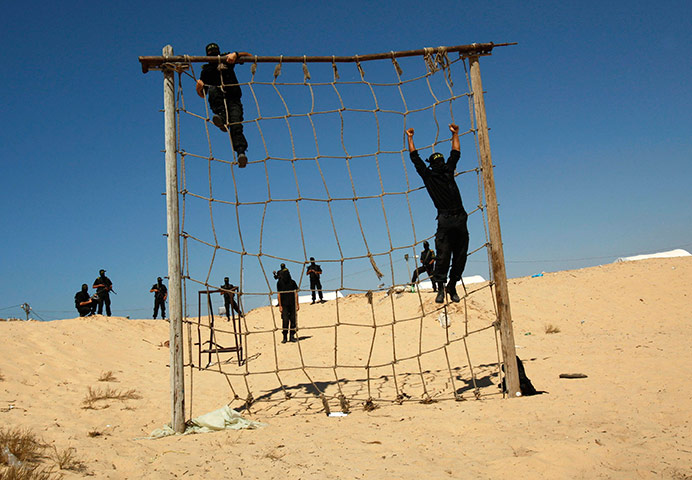24 hours in pics: Palestinian militants from Islamic Jihad hold a training drill