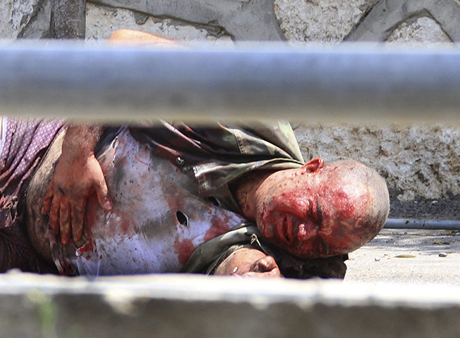 Israel and Lebanon clash: A Lebanese soldier lies injured