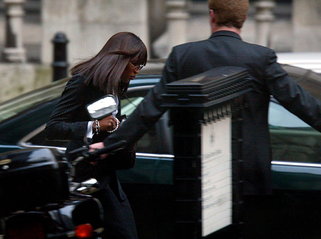 Naomi Campbell in court: February 2002: Naomi Campbell runs for her car outside the High Court