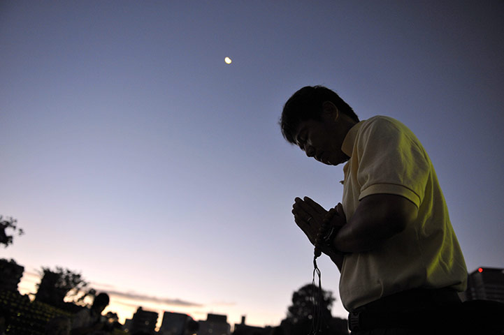 24 hours in pictures: Residents in Hiroshima offer prayers for a-bomb victims