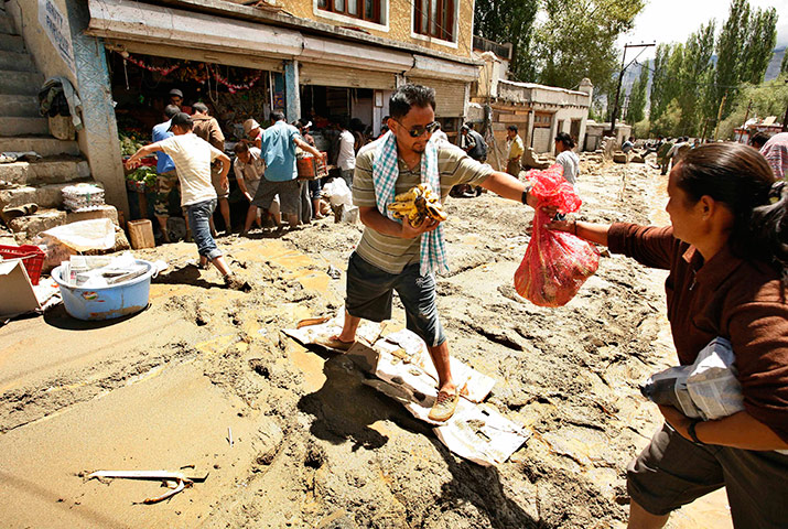 Leh flash floods: Local residents purchase food rations Choglamsar village