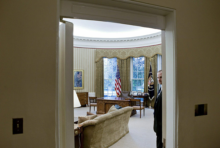 Oval Office redecoration: A member of the Secret Service stands guard in the redecorated Oval Office