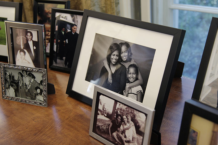 Oval Office redecoration: Family photos are displayed in the Oval Office