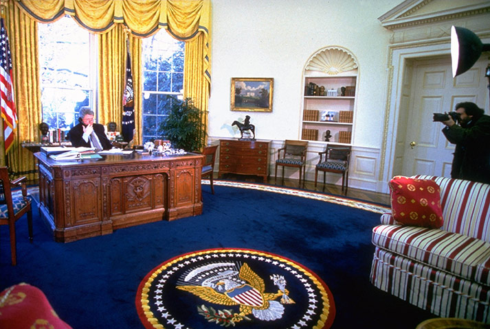 Oval Office redecoration: 1997: President Bill Clinton talking on the phone in the Oval Office