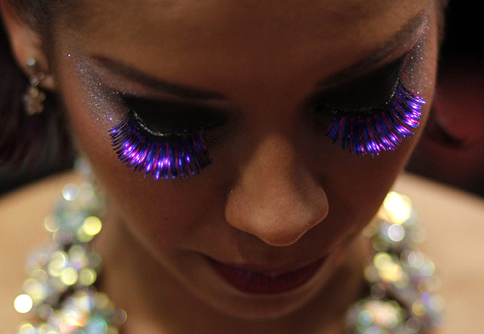 24 hours: Buenos Aires, Argentina: Tango dancer wearing fake eyelashes backstage 