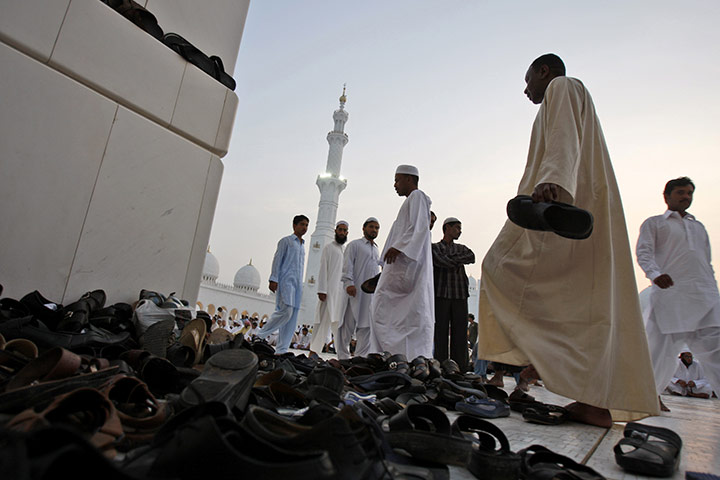 Eid begins: Muslim men at the Sheikh Zayed Ground Mosque in Abu Dhabi
