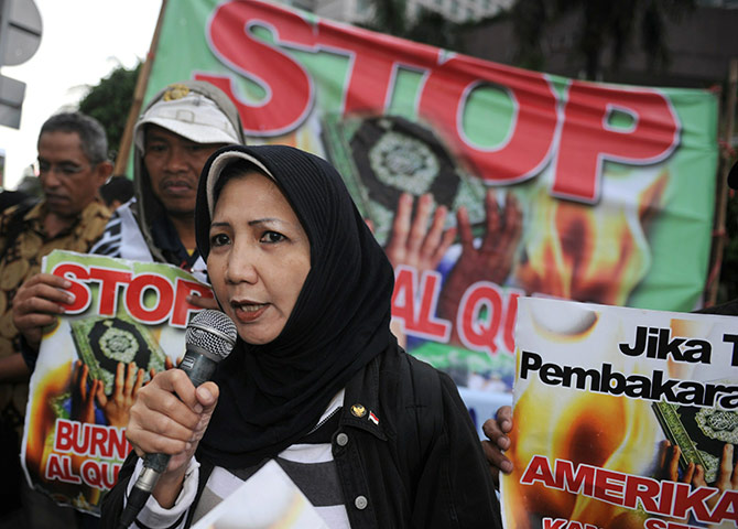 Qur'an Burning: A group of Indonesian Muslims and Christians rally at in Jakarta